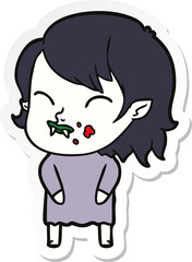 sticker of a cartoon vampire girl with blood on cheek