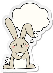 cartoon rabbit and thought bubble as a printed sticker