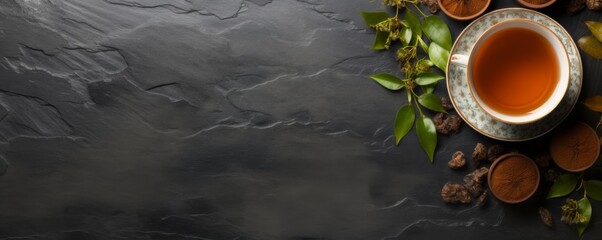 Obraz na płótnie Canvas Cup of hot tea and tea leaves on dark luxury stone background, banner. Generative Ai.