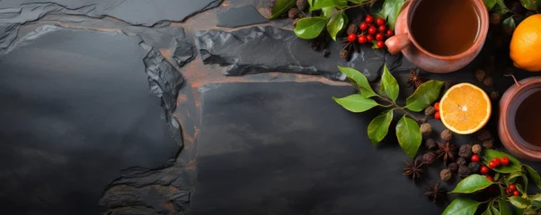 Foto op Plexiglas Cup of hot tea and tea leaves on dark luxury stone background, banner. Generative Ai. © annamaria