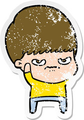 distressed sticker of a annoyed cartoon boy