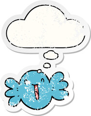cartoon happy candy and thought bubble as a distressed worn sticker