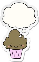 cartoon cupcake with face and thought bubble as a printed sticker