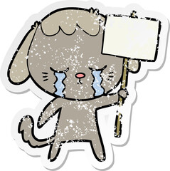 distressed sticker of a cartoon dog crying