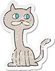 retro distressed sticker of a cartoon cat