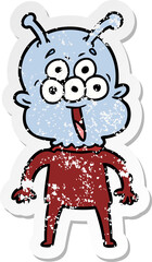 distressed sticker of a happy cartoon alien