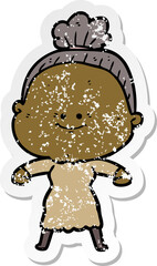 distressed sticker of a cartoon happy old woman