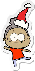 sticker cartoon of a happy old woman wearing santa hat