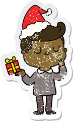 distressed sticker cartoon of a man wondering wearing santa hat