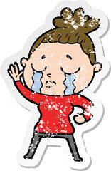 distressed sticker of a cartoon crying woman