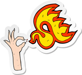 sticker of a cartoon hand and fire symbol
