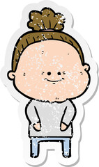 distressed sticker of a cartoon happy old woman