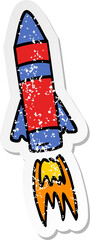 distressed sticker cartoon doodle of a space rocket
