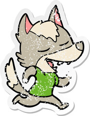 distressed sticker of a cartoon running wolf laughing