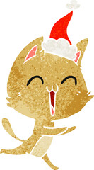 happy retro cartoon of a cat meowing wearing santa hat