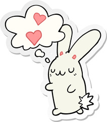 cartoon rabbit in love and thought bubble as a printed sticker