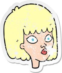 retro distressed sticker of a cartoon female face