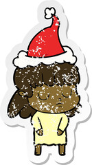 distressed sticker cartoon of a indifferent woman wearing santa hat