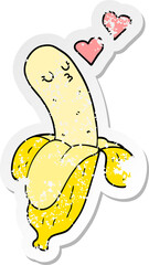 distressed sticker of a cartoon banana in love