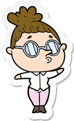 sticker of a cartoon woman wearing glasses
