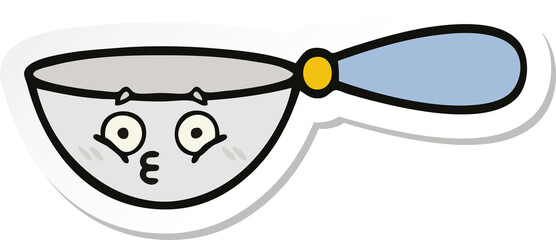 sticker of a cute cartoon measuring spoon