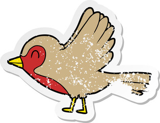 distressed sticker of a cartoon robin taking flight