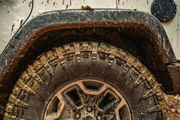 Dirty Muddy SUV Wheel Close Up