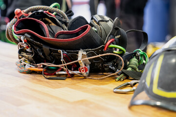 Tree climbing arborist climbing gear equipment for safety with colorful ropes and harness 