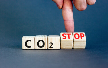 CO2 stop symbol. Concept word CO2 or CO2 stop on a beautiful wooden cubes. Beautiful grey table...