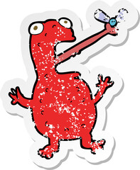 retro distressed sticker of a cartoon poisonous frog catching fly
