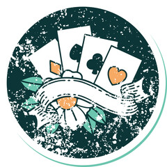 distressed sticker tattoo style icon of cards and banner