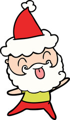 man with beard sticking out tongue wearing santa hat