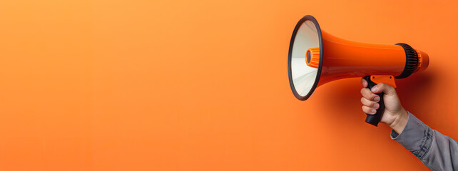 Hand holding a megaphone announces sales and discounts, on a vibrant orange background. Marketing and commercial concept banner with copy space, made with Generative AI. - obrazy, fototapety, plakaty