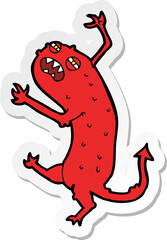 sticker of a cartoon little monster