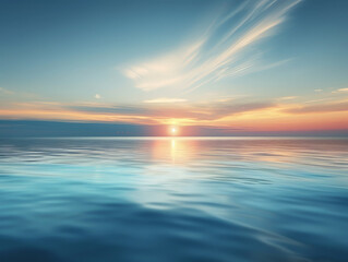 Fototapeta na wymiar A beautiful blue ocean with a sun setting in the background