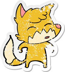 distressed sticker of a cartoon fox