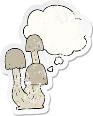 cartoon mushroom and thought bubble as a distressed worn sticker