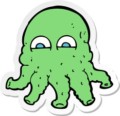 sticker of a cartoon alien squid face