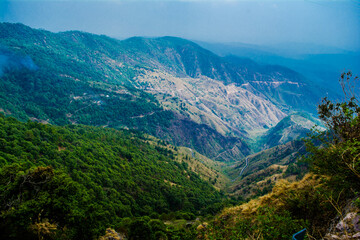 Beautiful  curvy Road on the mountains of Lansdowne, Uttarakhand. Aerial view of amazing curved road through the mountains.