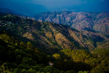 Naklejka premium Beautiful Green Mountains and valleys of Lansdowne in the district of Garhwal, Uttarakhand. Lansdown Beautiful Hills. The beauty of nature on the hills of Uttrakhand.