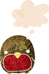 cute cartoon penguin and thought bubble in retro textured style