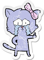 distressed sticker of a cartoon cat