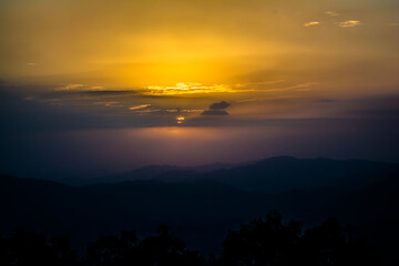 Sunset view from the mountains of Lansdowne. Mountain Sunset view in Lansdowne. Amazing  golden sunset seen through forest drive, Lansdowne Uttarakhand.