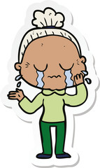 Obraz premium sticker of a cartoon crying old lady