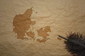 map of denmark on a old paper background with old pen