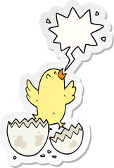 cartoon bird hatching from egg and speech bubble sticker