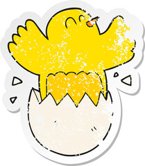 retro distressed sticker of a cartoon hatching egg © lineartestpilot