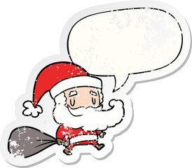 cartoon santa claus carrying sack of presents and speech bubble distressed sticker