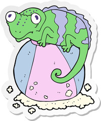 sticker of a cartoon chameleon on ball