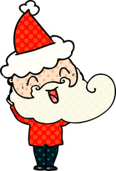 happy bearded man wearing santa hat